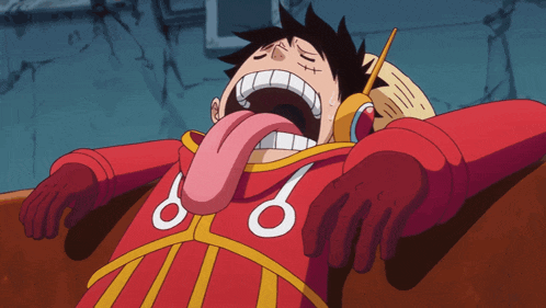 monkey d luffy is laying down with his tongue sticking out