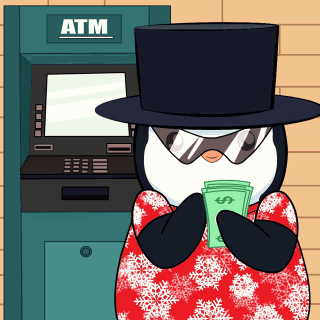 a penguin is standing in front of an atm