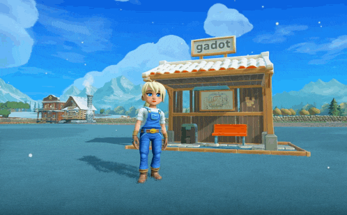 a girl stands in front of a building that says gadot on it