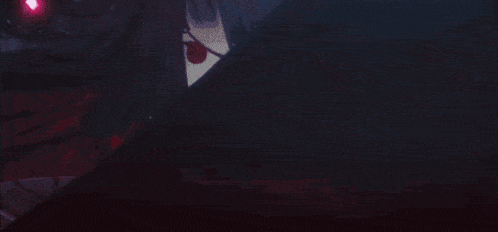 a close up of a person 's face with red eyes and a red object in her hand .