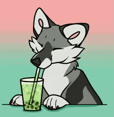 a husky dog is drinking a drink through a straw .