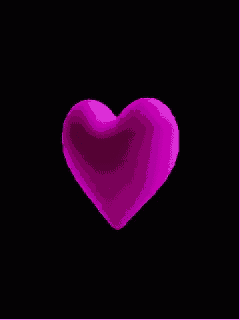 a glowing purple heart on a black background