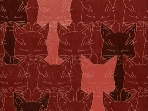 a pattern of red and black cats with big eyes