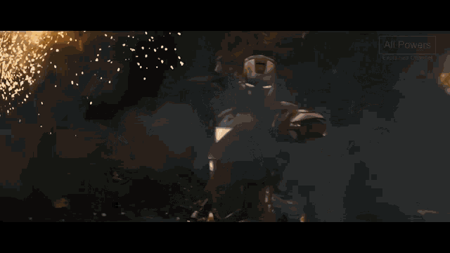 a man in a superhero costume is holding something in his hand with the words all power on the bottom right