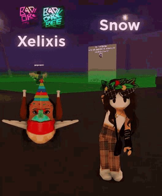 a girl in a plaid skirt is standing next to a girl in a birthday hat