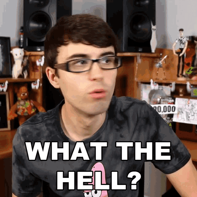 a man wearing glasses and a tie dye shirt is asking what the hell