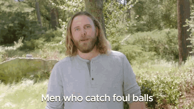 a man says men who catch foul balls in front of trees