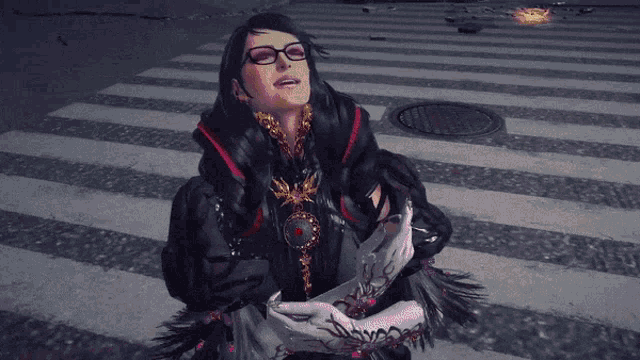 a woman wearing glasses and a necklace stands on a crosswalk