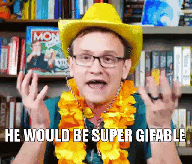 a man wearing a yellow hat and a flower lei says he would be super gifiable