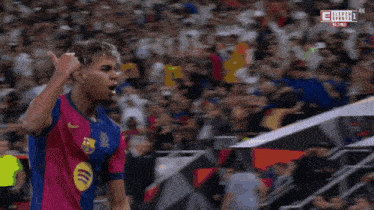 a soccer player wearing a jersey that says ' e ' on it