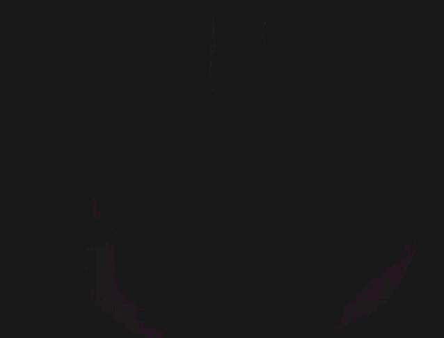 a silhouette of a person with a smile on their face against a pink background