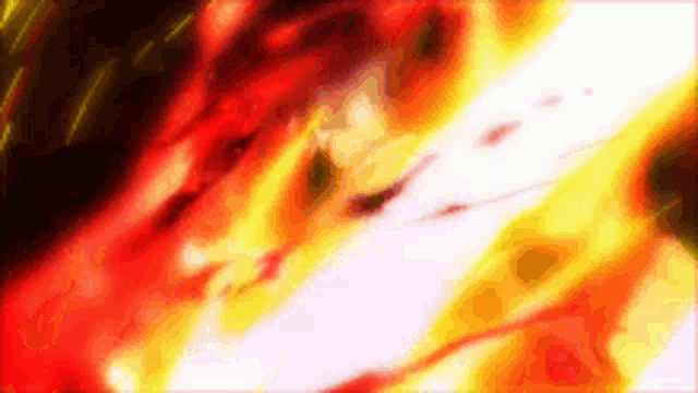 a close up of a red , yellow , and black background with a lot of fire coming out of it .