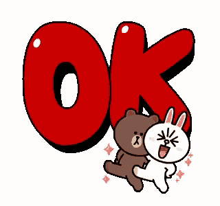 a brown bear and a white rabbit are hugging under a large red ok sign .