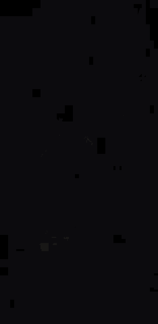 a blurred image of a person standing in the dark