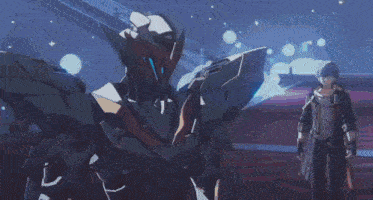 a man and a robot are standing next to each other .