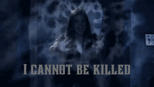 a woman in a dark room with the words i cannot be killed
