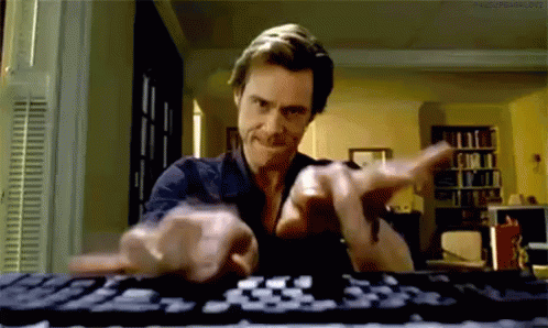 Busy GIF - Typing Jim Carrey GIFs