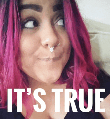 a woman with pink hair has the words it 's true above her face