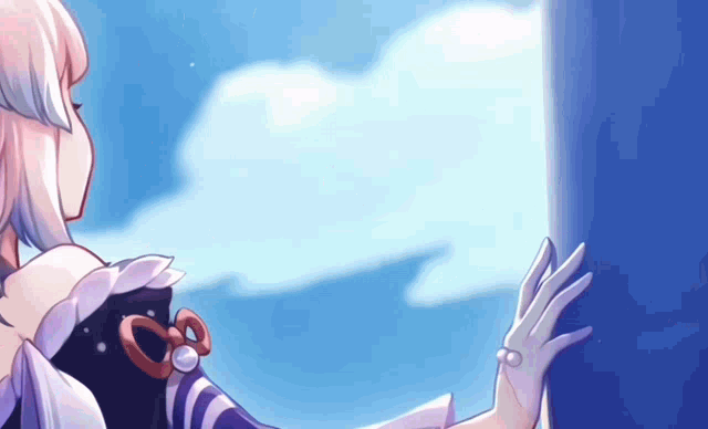 a girl is standing in front of a blue wall and looking out a window .