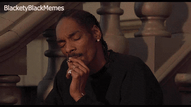 snoop dogg smoking a cigarette in front of a staircase with the caption blacketyblackmemes