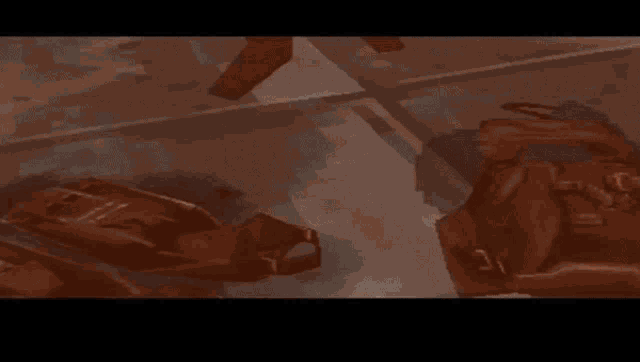 a video game screen shows a few objects including one that says ' s ' on it