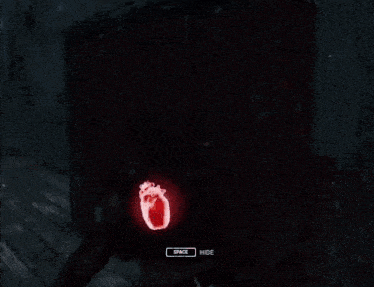 a person in a video game has a red heart on their finger