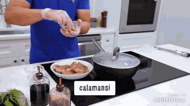 a man prepares food with the word calamansi on the stove top