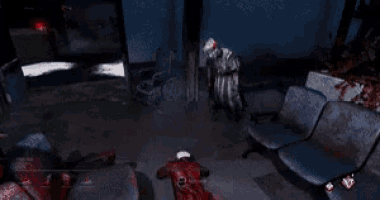 a man in a wheelchair is standing in a dark room with blood coming out of the chairs .