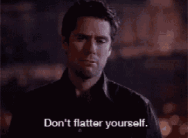 a man in a black shirt says do n't flatter yourself .