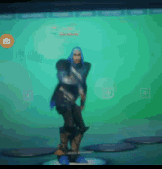 a blurry picture of a person dancing in front of a green background