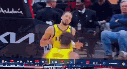 a basketball game is being played on a television screen