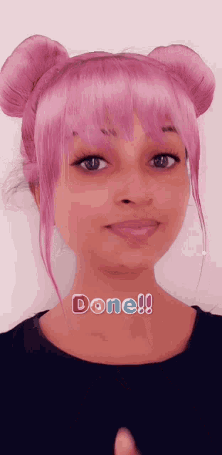 a girl with pink hair has the word done written on her neck