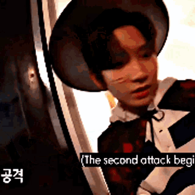 a man wearing a hat says the second attack began