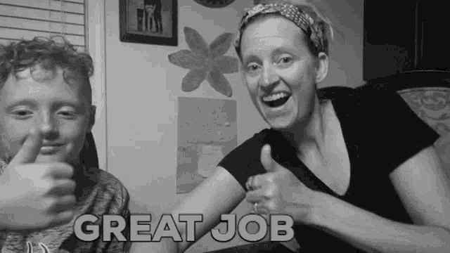 a black and white photo of a woman and a boy giving a thumbs up with the words great job written below them