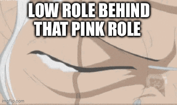 a close up of a person 's face with the words `` low role behind that pink role '' .