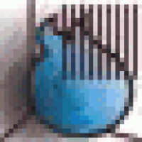 a blue comb is sitting on a table next to a blue guitar .