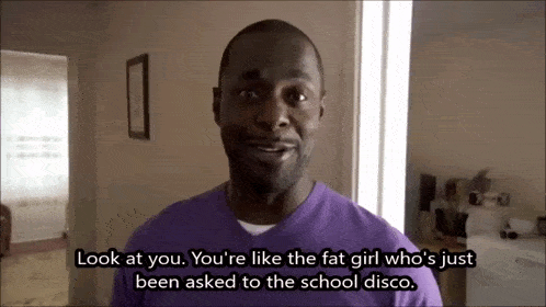 a man in a purple shirt says look at you