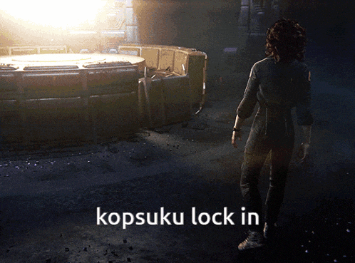 a woman is standing in a dark room with the words kopsuku lock in written below her