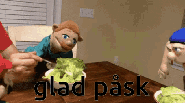 a picture of a puppet eating lettuce with the words glad pask on the bottom