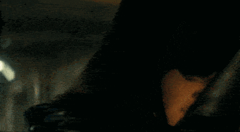 a close up of a woman 's face with the words [ sighs ] visible