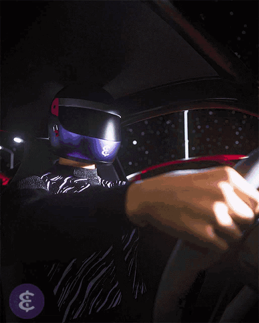 a person wearing a purple helmet is driving a car at night