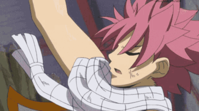 a drawing of a person with pink hair and a scarf around their neck with the word fairy tail written on the bottom