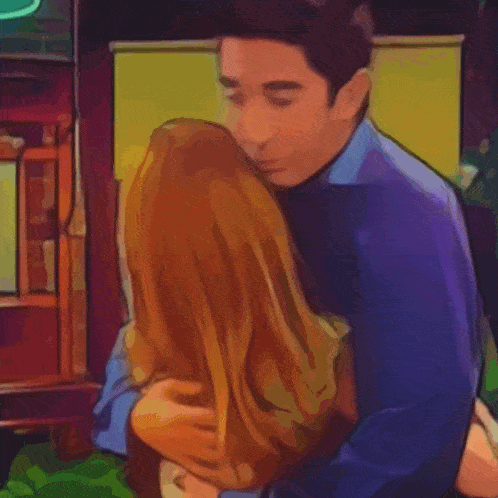 a man in a blue shirt is hugging a woman with blonde hair