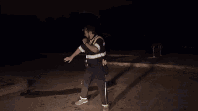 a man with a flashlight on his head is saying barf sounds