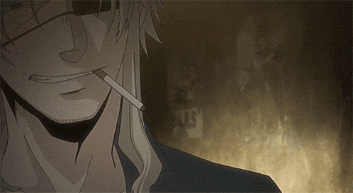 a man is smoking a cigarette with a bandage around his eye