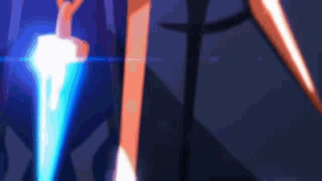 a sword with a blue blade is glowing in the dark .