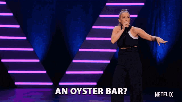 a woman singing into a microphone with the words an oyster bar on the bottom