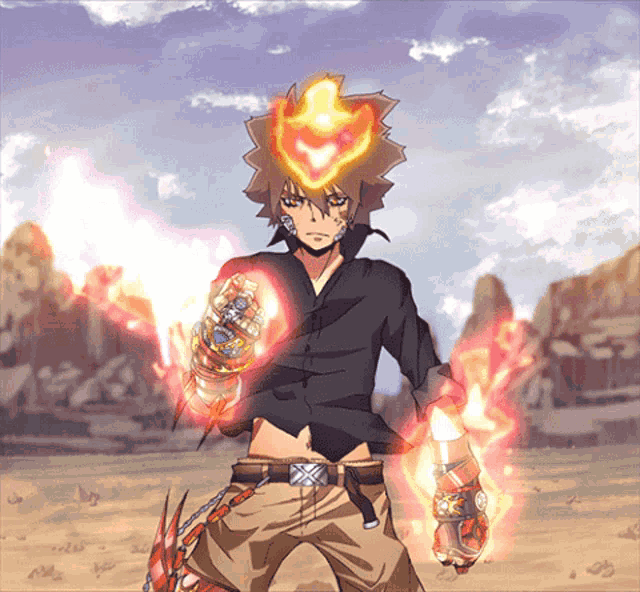 a man in a black shirt is holding a flame in his hand