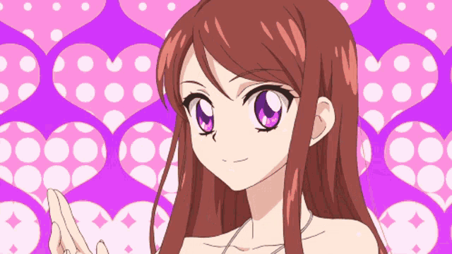 a girl with long red hair and purple eyes is standing in front of a polka dot heart pattern
