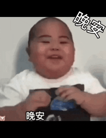 a baby is sitting in a chair and smiling .